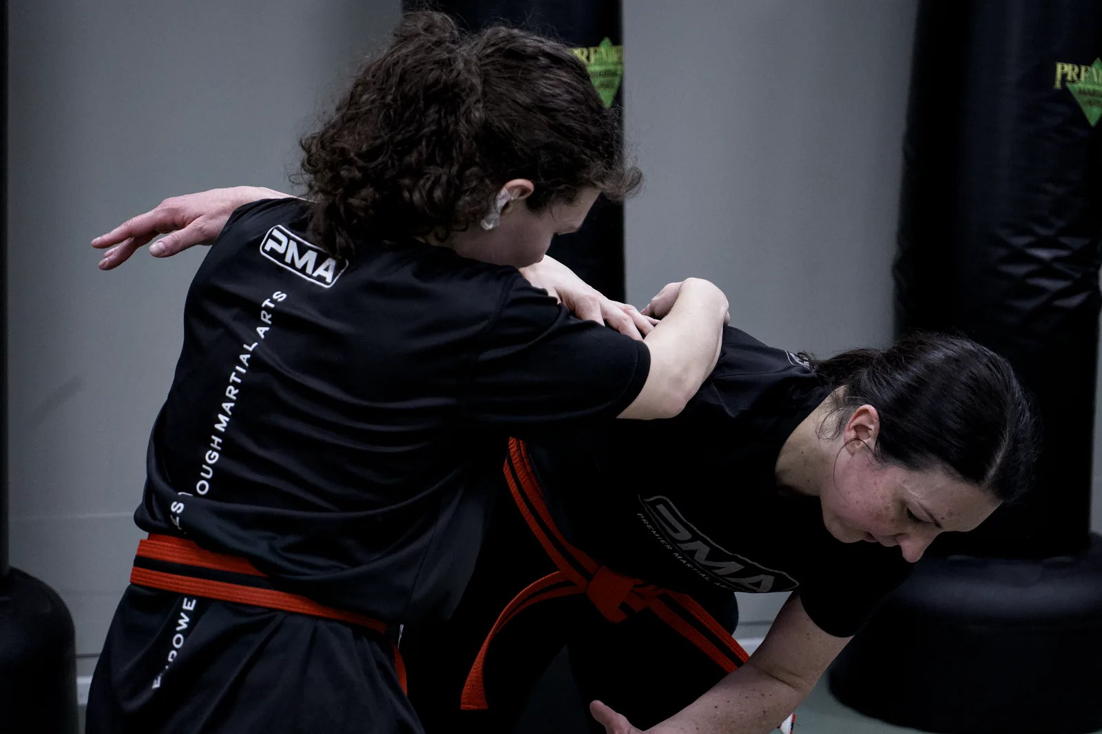 An instructor demonstrating a practical self-defence escape